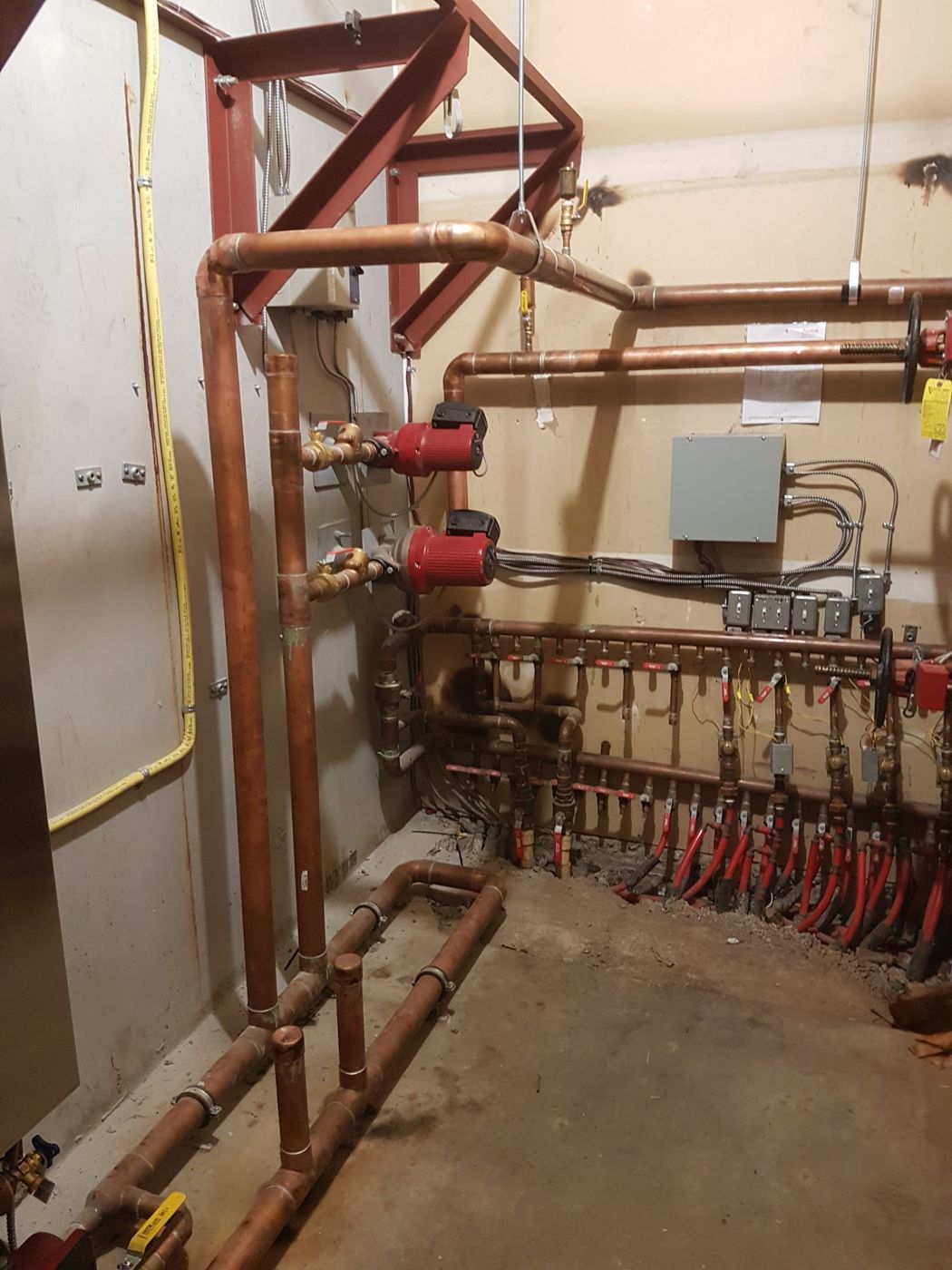 Copper heating manifold in a mechanical room